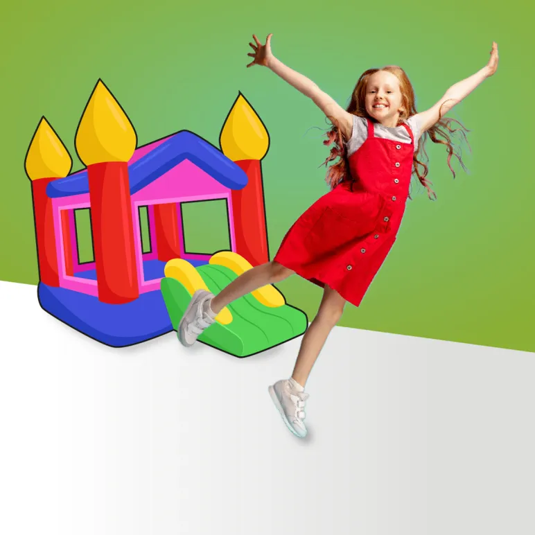 uśmiechnięta, skacząca dziewczynka na tle dmuchanej zjeżdżalni