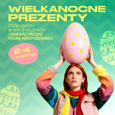 dziewczyna trzyma jajko wielkanocne nad głową